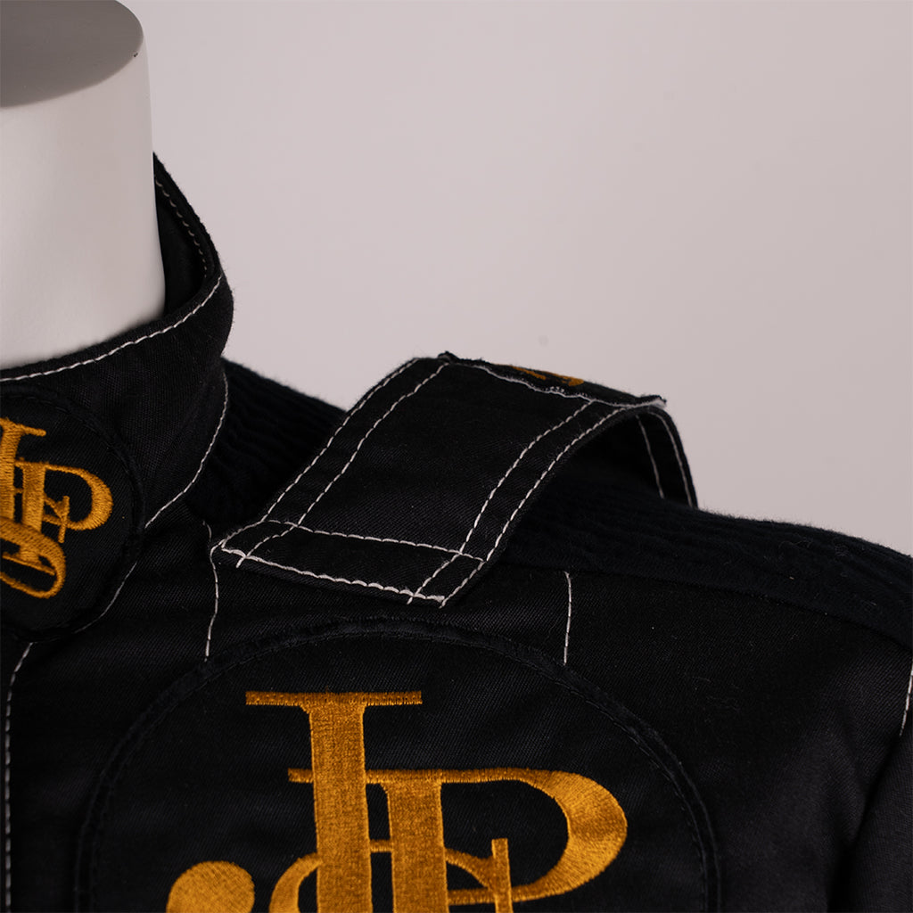 Ayrton Senna – Lotus JPS racing suit worn at the Imola Grand Prix (1985)